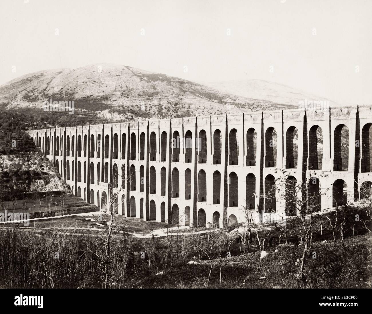 Vintage 19th century photograph: The Aqueduct of Vanvitelli or Caroline Aqueduct is an aqueduct built to supply the Reggia di Caserta and the San Leucio complex, supplied by water arising at the foot of Taburno, from the springs of the Fizzo, in the territory of Bucciano, which it carries along a winding 38 km route, Italy. Stock Photo