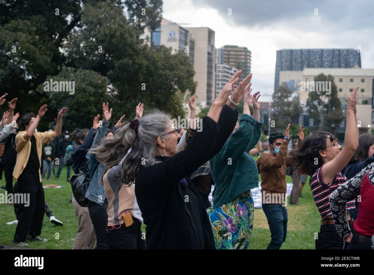 Melbourne, Victoria. 16 January 2021. Free the Refugees Block Party. Protesters with high spirits dancing in sync. Jay Kogler/Alamy Live News Stock Photo