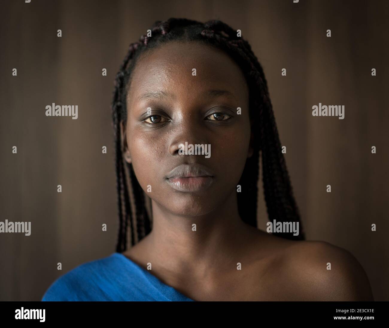Young black African American woman portrait in indoors Stock Photo - Alamy