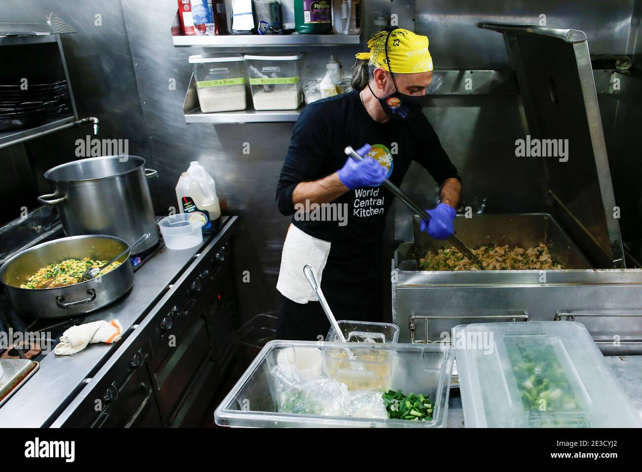 A Volunteer Of World Central Kitchen An International Aid Organization Founded By Chef Jose Andres Prepares Food At One Of His Washington Restaurants For Security Personnel Deployed Ahead Of U S President Elect Joe