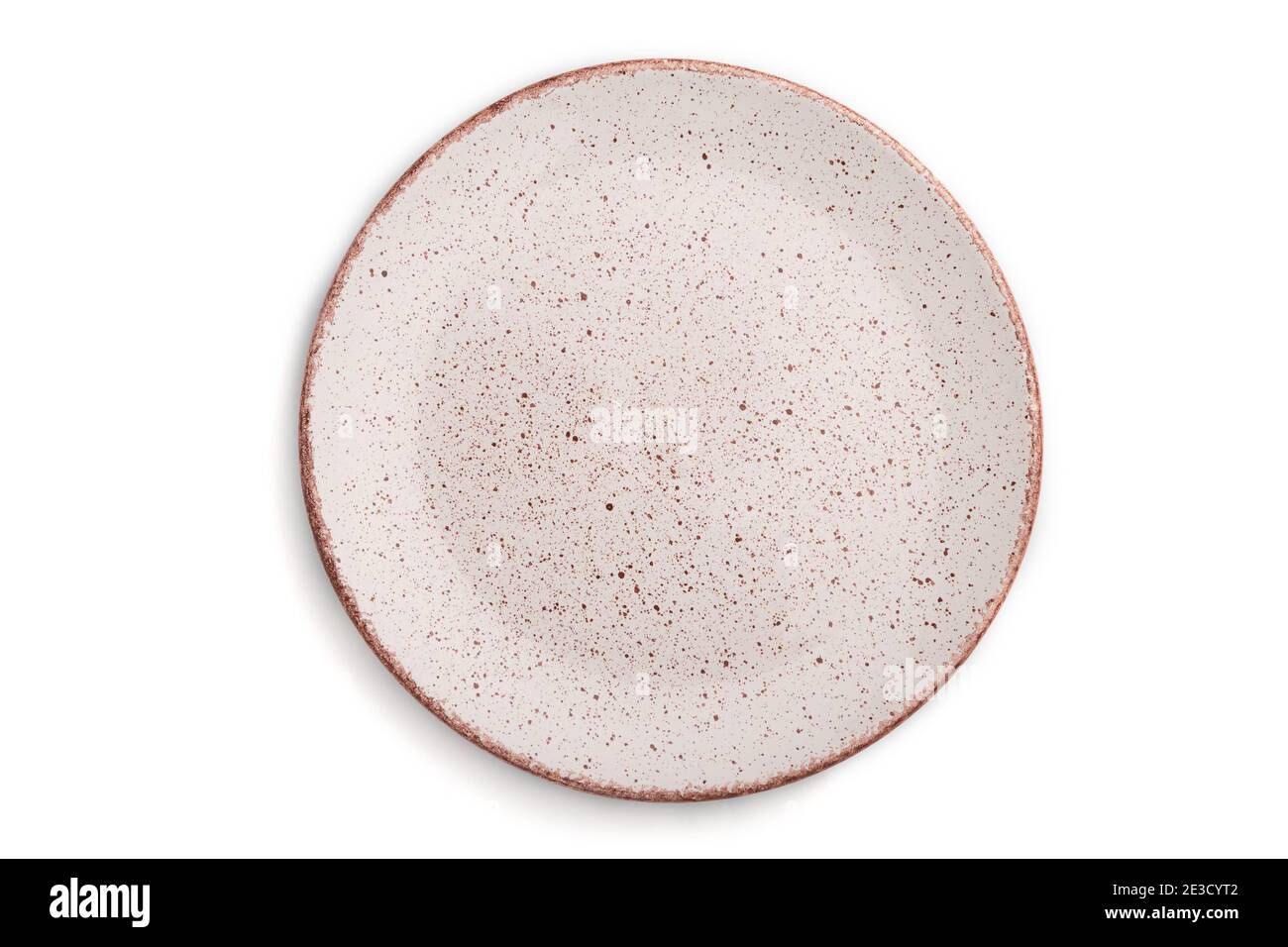 Empty pink dotted ceramic plate isolated on white background. Top view ...