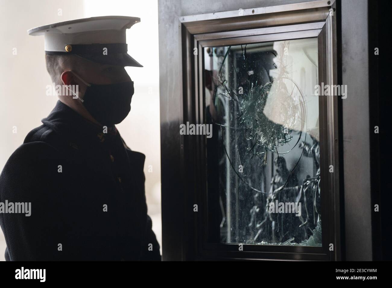Washington, United States. 18th Jan, 2021. White House Marine sentries rehearse the arrival of President-elect Joe Biden next to a window smashed by insurgents during rehearsals for the 59th inaugural ceremony for President-elect Joe Biden and Vice President-elect Kamala Harris at the U.S. Capitol on January 18, 2021 in Washington, DC. Biden will be sworn-in as the 46th president on January 20th. Pool Photo by Jim Lo Scalzo/UPI Credit: UPI/Alamy Live News Stock Photo