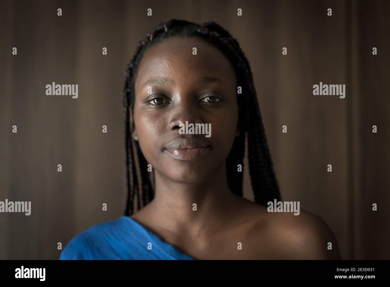 Young black African American woman portrait in indoors Stock Photo - Alamy