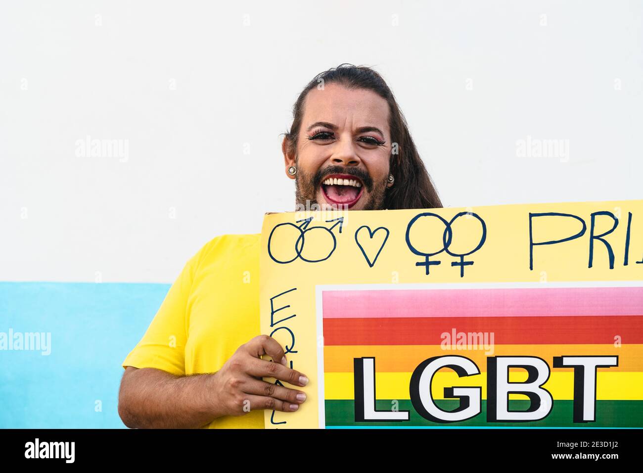 Happy drag queen activist having fun during gay pride parade - LGBT social movement concept Stock Photo