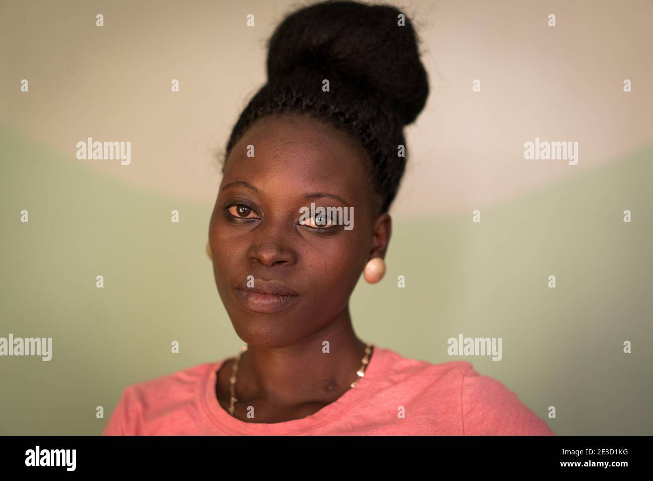 Young candid black African woman portrait in indoors Stock Photo - Alamy