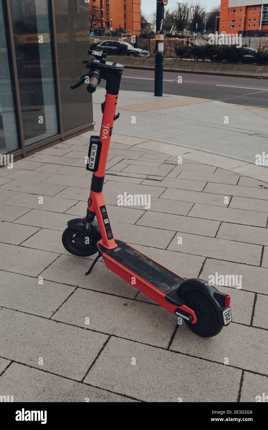 Birmingham, UK - January 17, 2021: VOI rental electric scooter on a street in Birmingham, UK. The e-scooters are available in Birmingham and Coventry Stock Photo