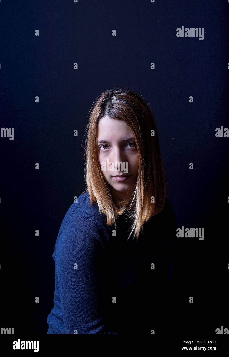 Female in blue lights Stock Photo Alamy