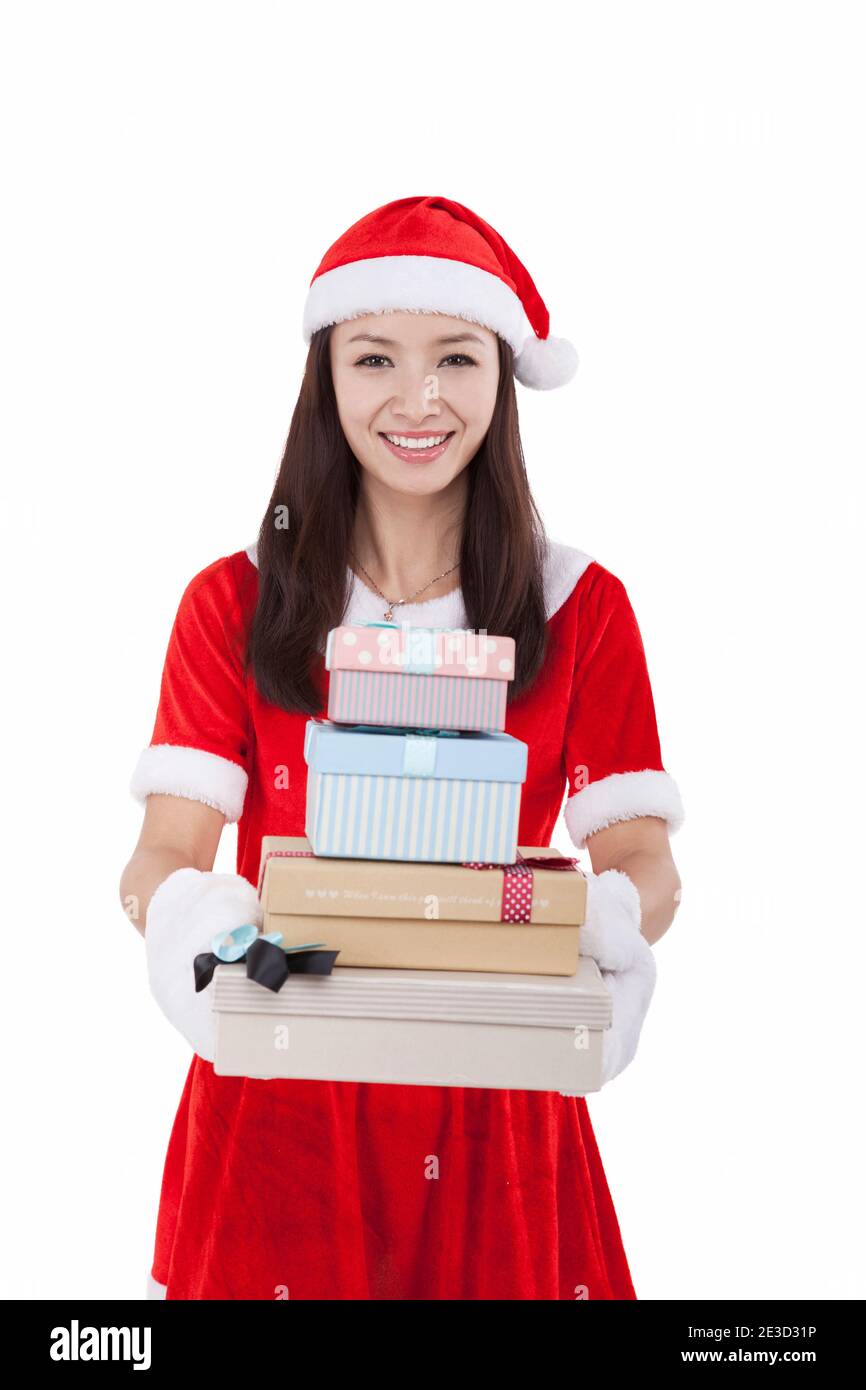 Three young women wearing santa hi-res stock photography and images - Alamy