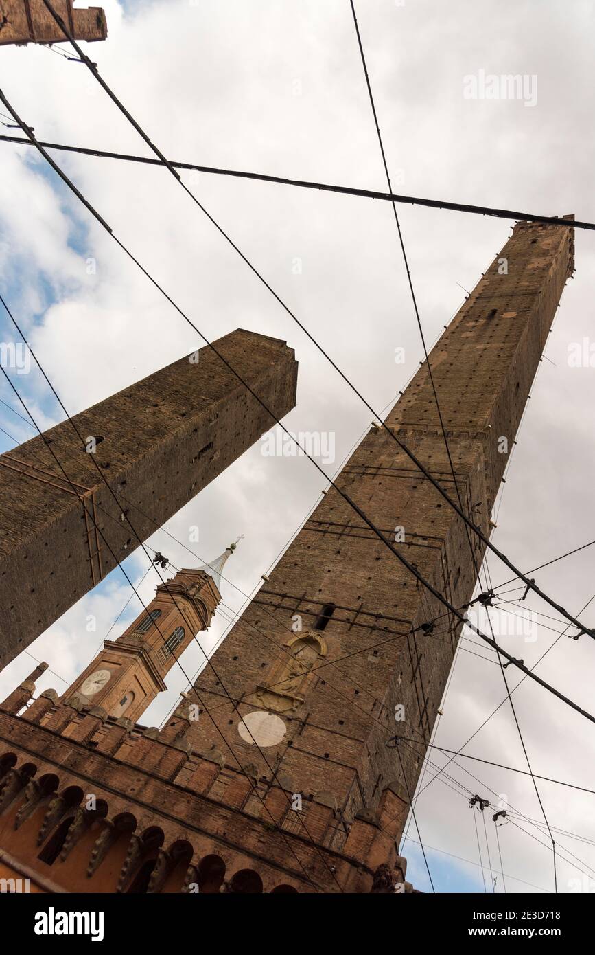 A view of the two towers of Bologna Italy, the Asinelli Tower and the Garsenda Tower bothe ancient leaning towers. Stock Photo