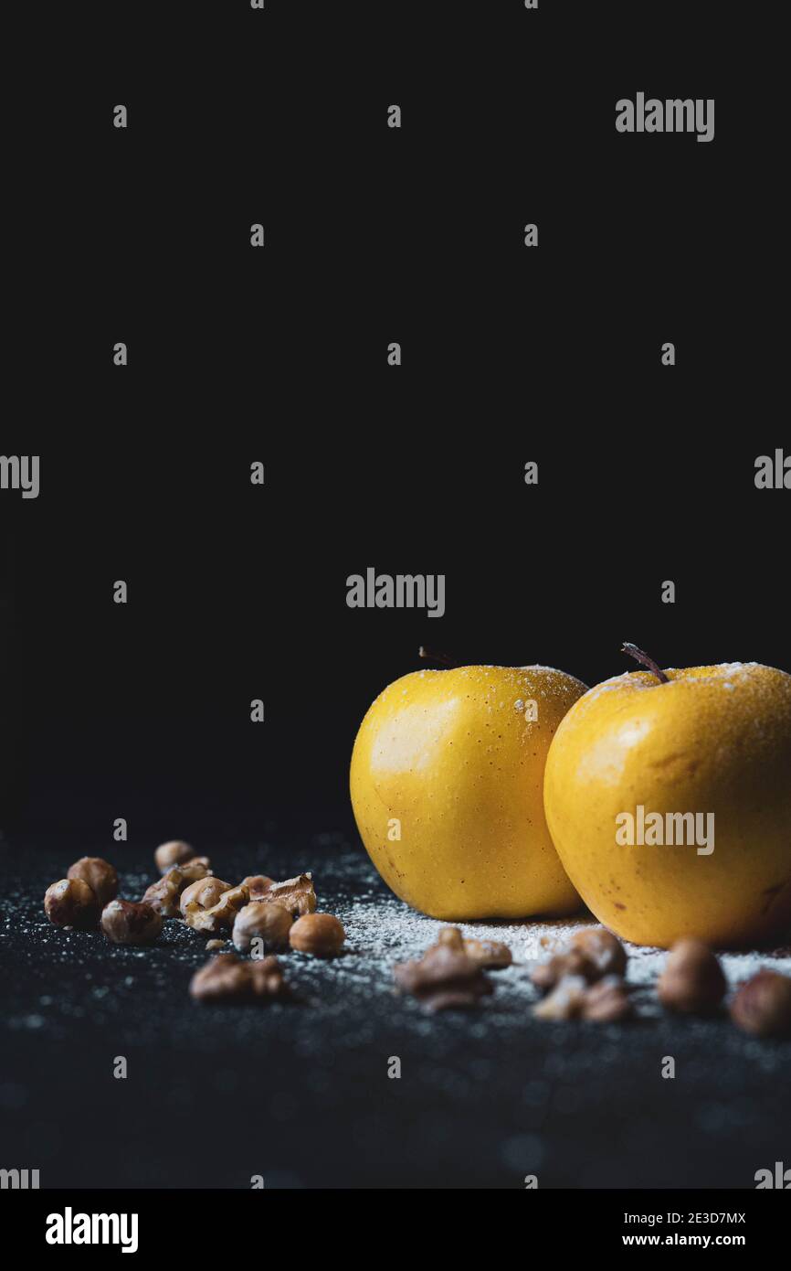 Yellow apple with nuts Stock Photo