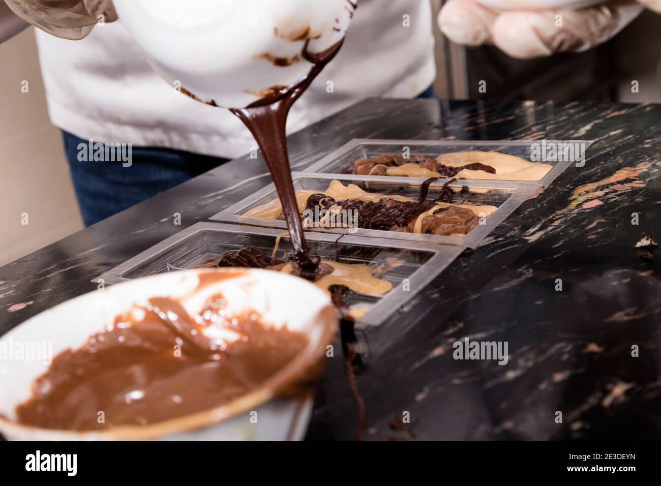 Pouring chocolate molds hires stock photography and images Alamy