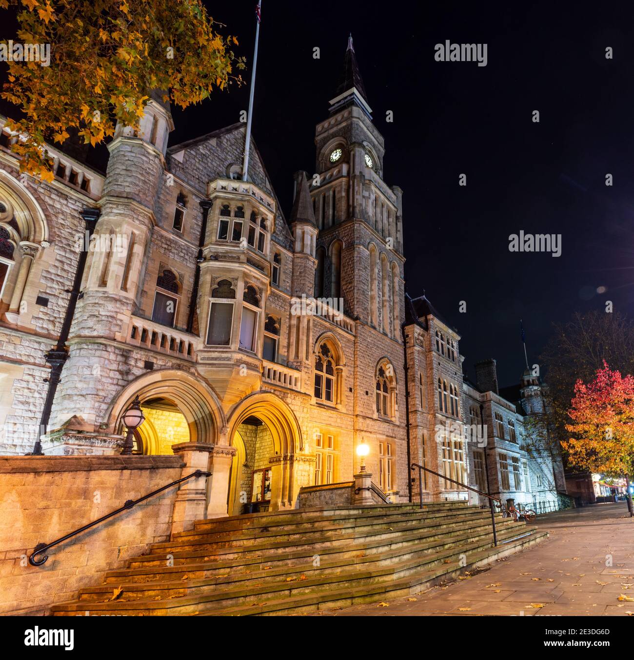The Victorian gothic town hall of the London Borough of Ealing is lit at night. Stock Photo