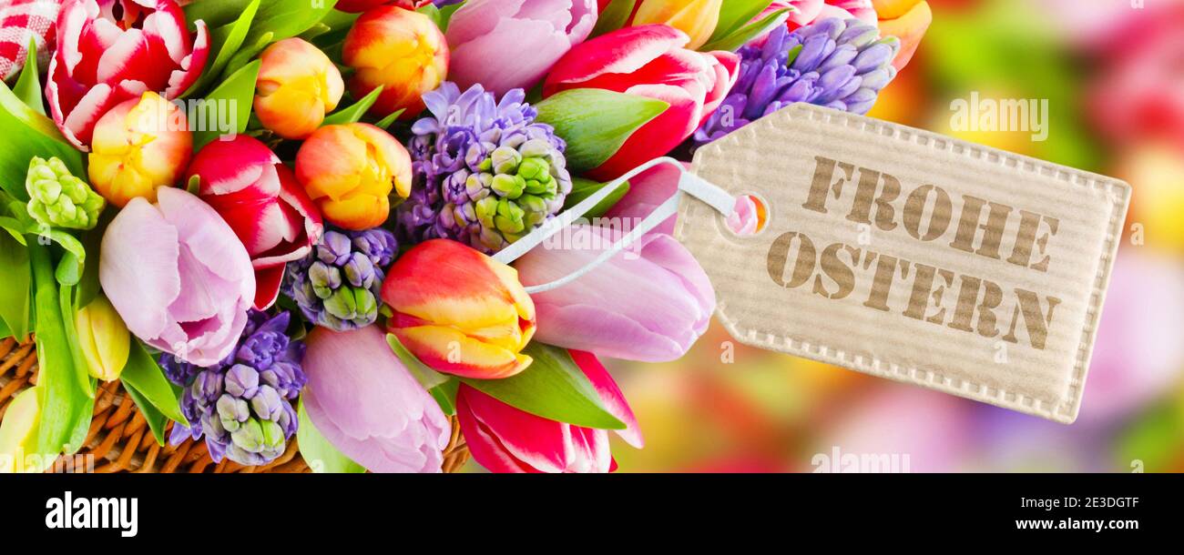 Springtime flowers and German Happy Easter Stock Photo