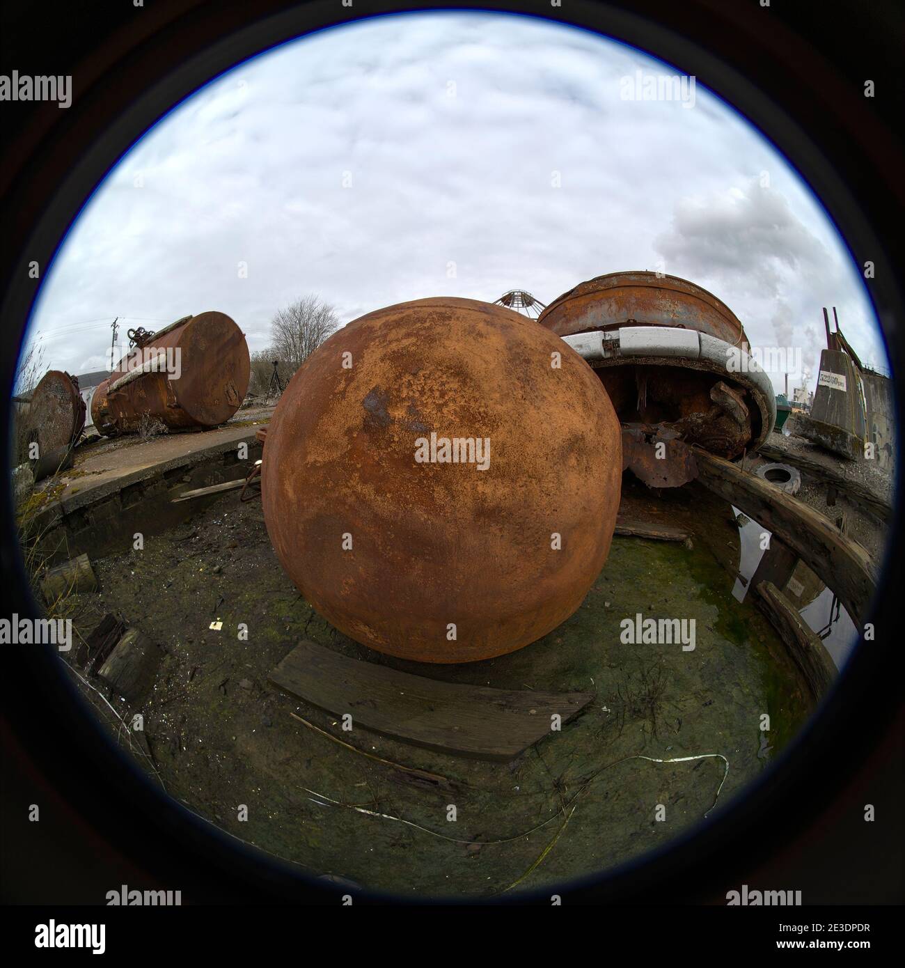 Large, old buoys and floats on shore in Tacoma in a fisheye view. Stock Photo