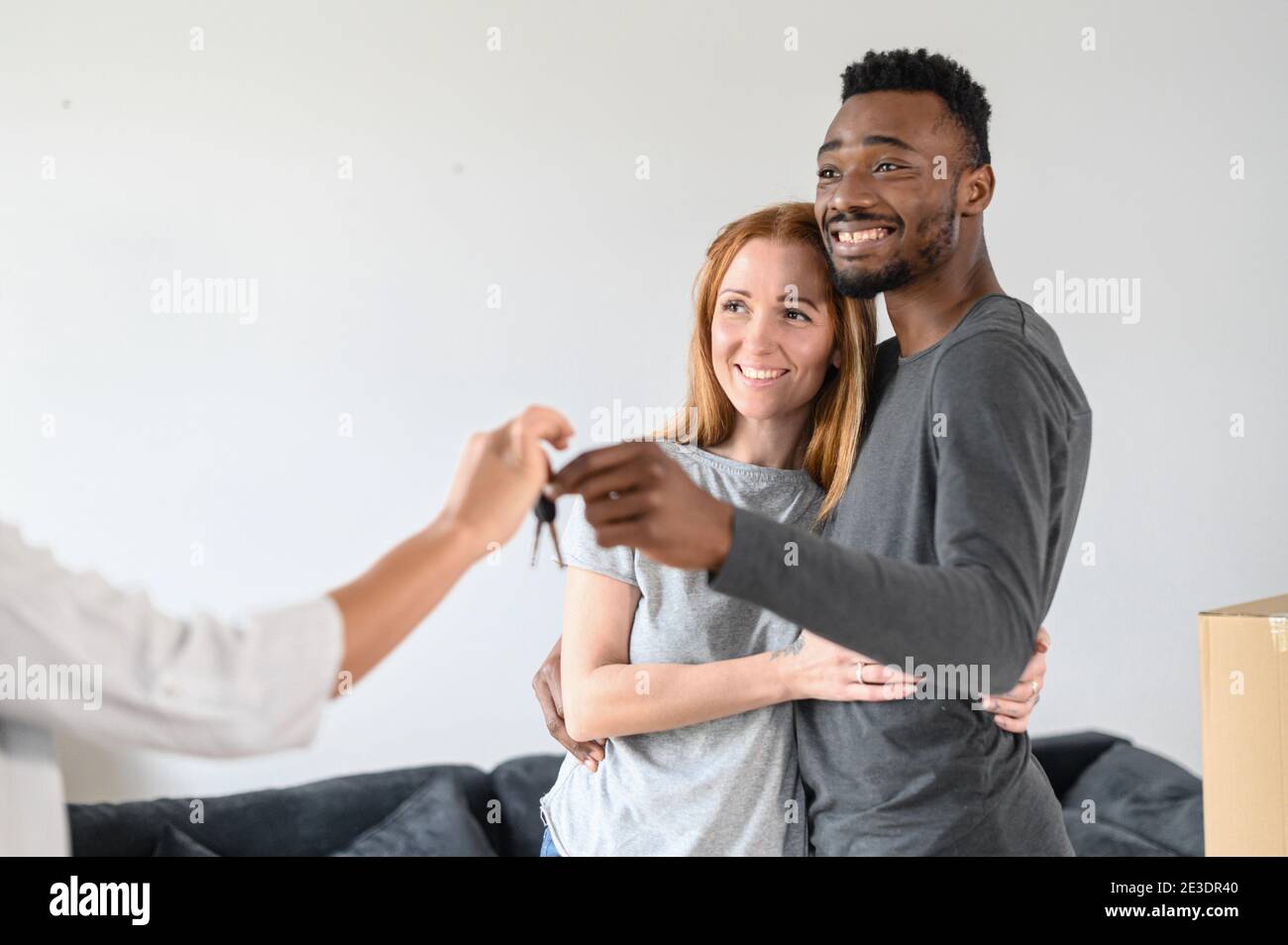 family, couple, relocation, mixed race, estate Stock Photo