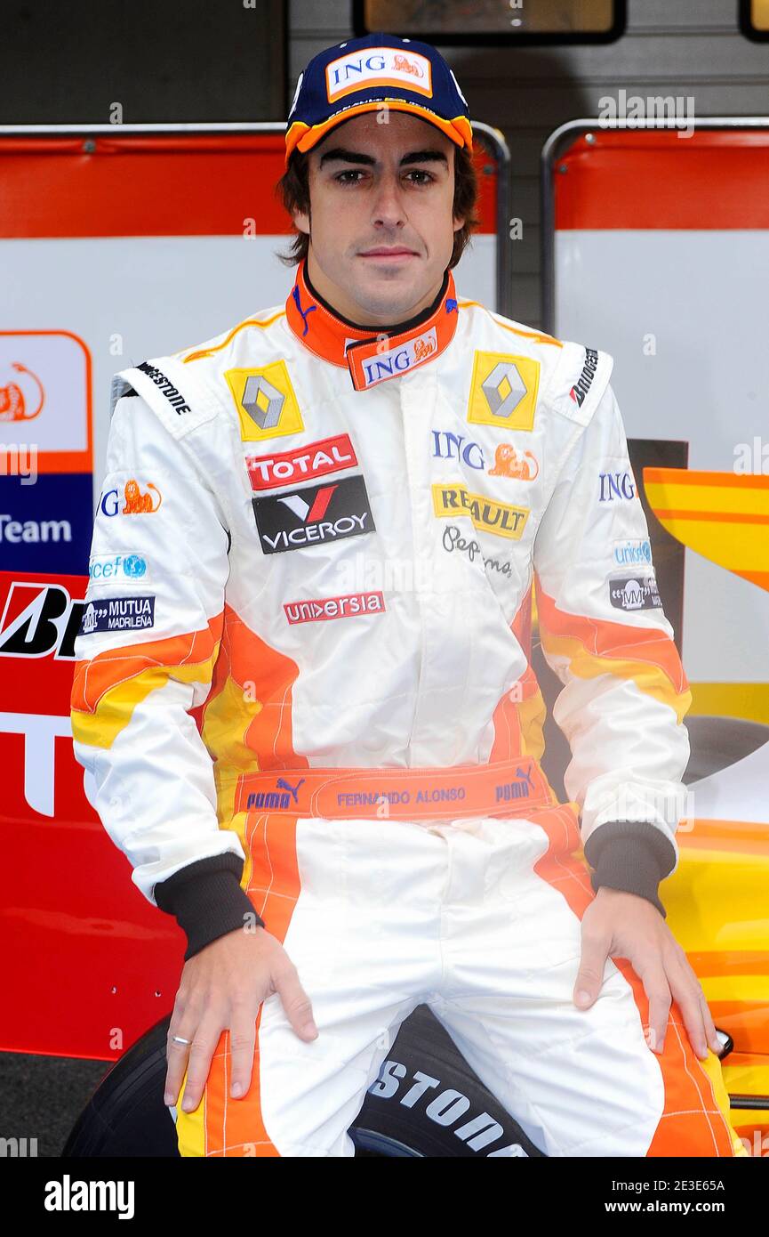 Renault Formula One drivers Fernando Alonso poses for a photo after  unveiling the new R29 car