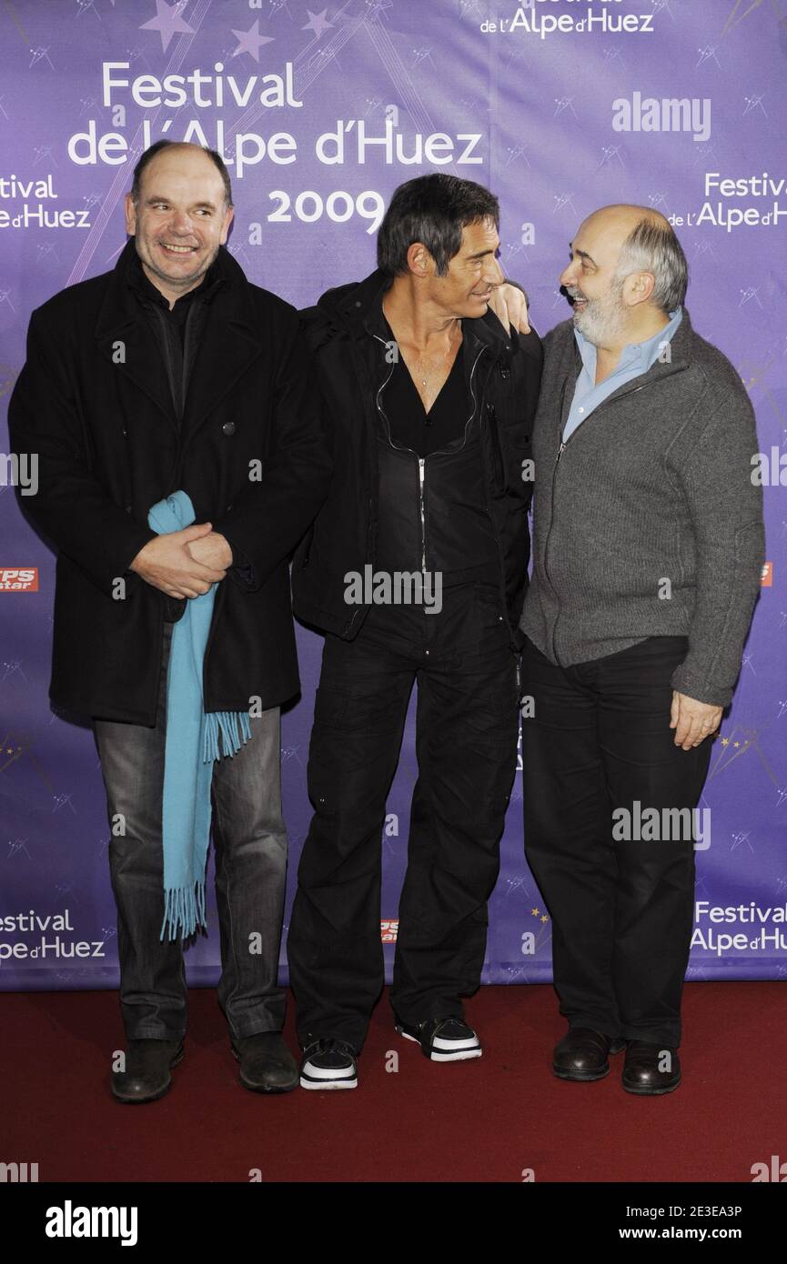 (L to R) Gerard Lanvin, Jean-Pierre Darroussin and Gerard Jugnot pose during the 12th 'Alpe d'Huez comedy Film Festival' held at l'Alpe d'Huez, Freance, on January 22, 2009. Photo by Guignebourg-Taamallah/ABACAPRESS.COM Stock Photo