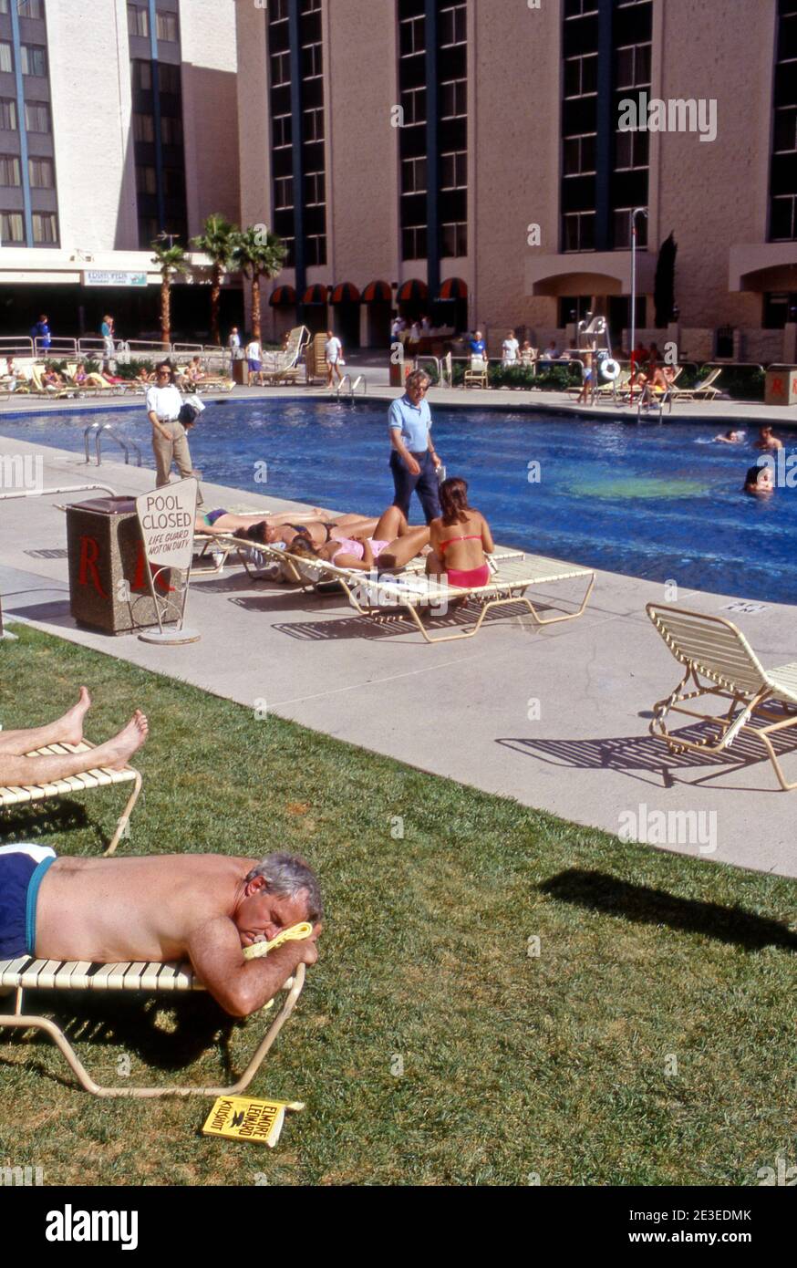 People relaxing poolside at the Riviera Hotel in Las Vegas, NV