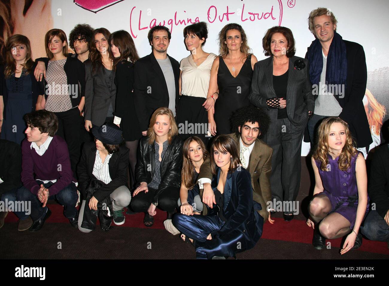 Director Lisa Azuelos (C) poses with the cast members as they arrive for the premiere of 'Lol' held at Gaumont Marignan theater in Paris, France on February 2, 2009. Photo by Denis Guignebourg/ABACAPRESS.COM Stock Photo