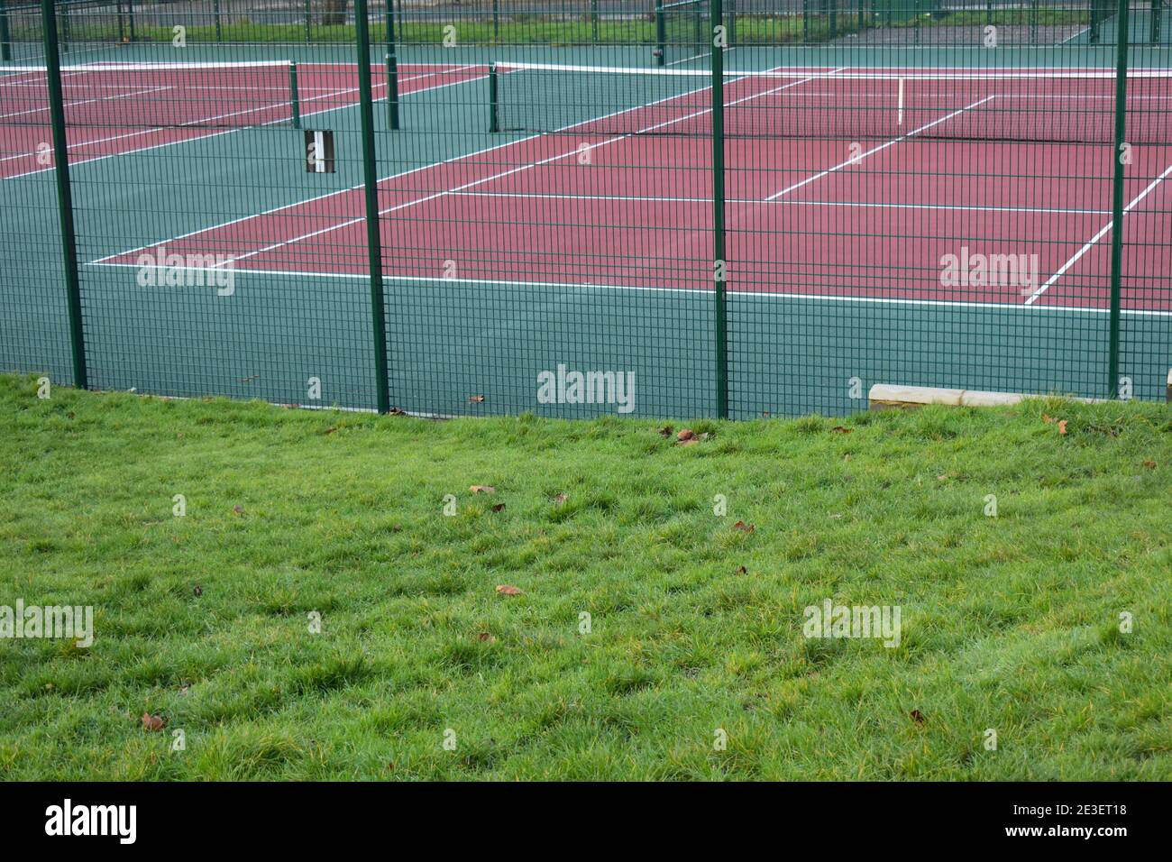 Hard asphalt or concrete coated with various materials tennis court is faster than clay but not as fast as grass for players with big serves forehands Stock Photo