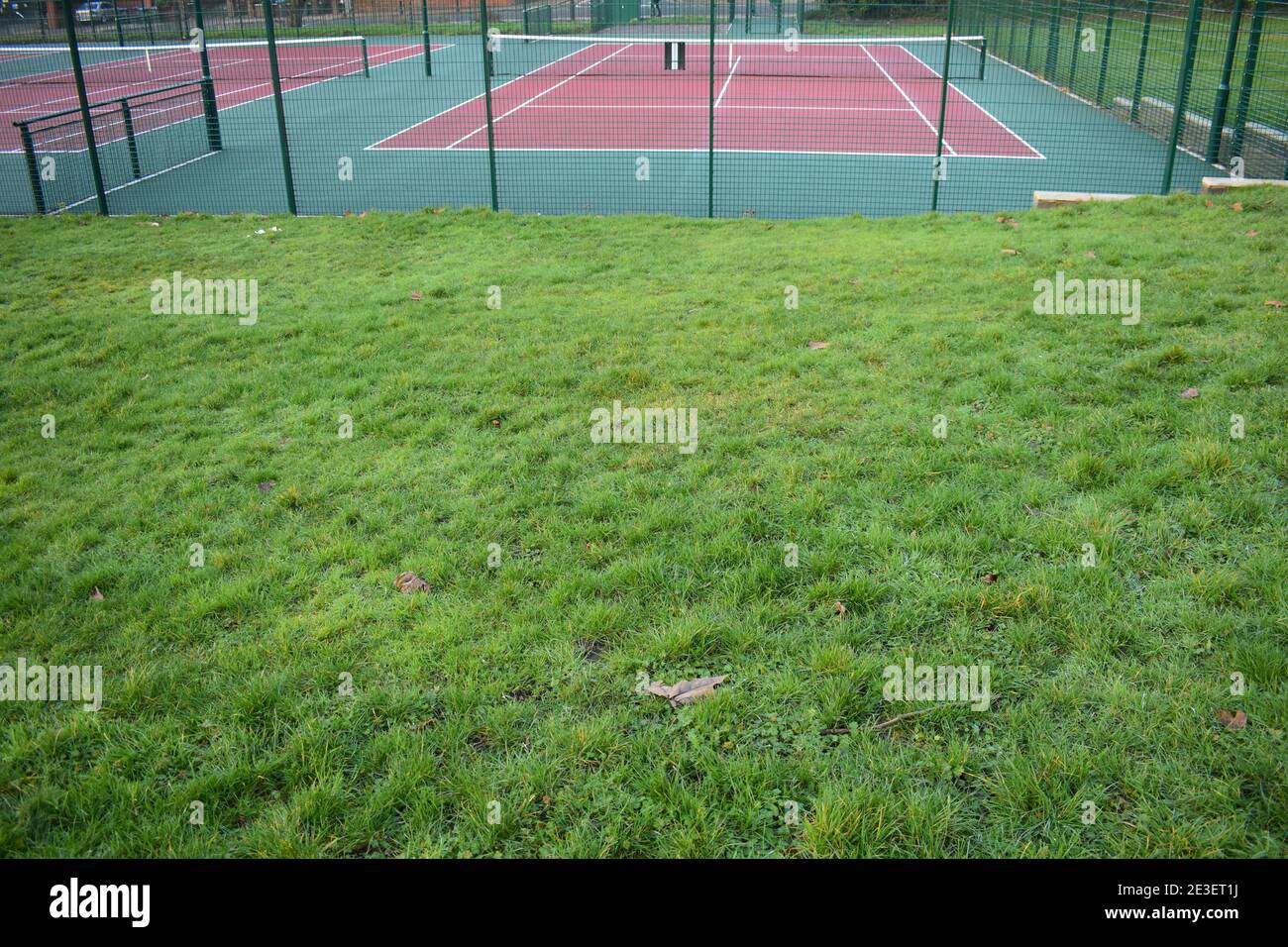 Hard tennis court is made of asphalt or concrete covered with acrylic to seal the top mark lines and provide better ground for player bounce and speed Stock Photo