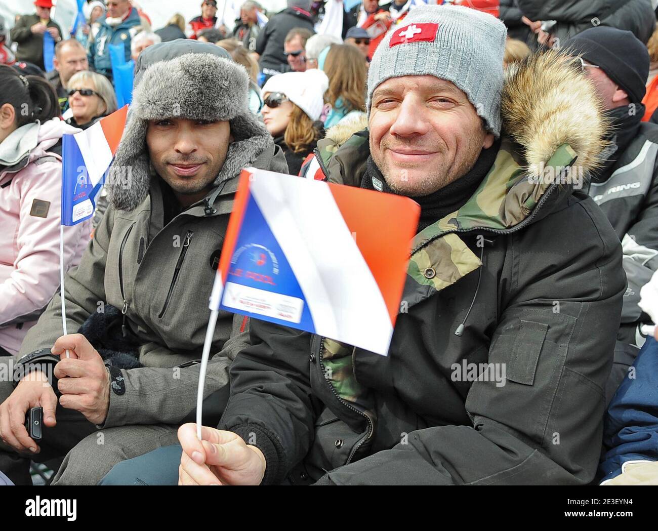 Eric Judor and Samuel Le Bihan supporting French female team during the  World Ski Championships in Val d'Isere, France on February 9, 2009. Photo  by Jean-Pierre Noisillier/ABACAPRESS.COM Stock Photo - Alamy