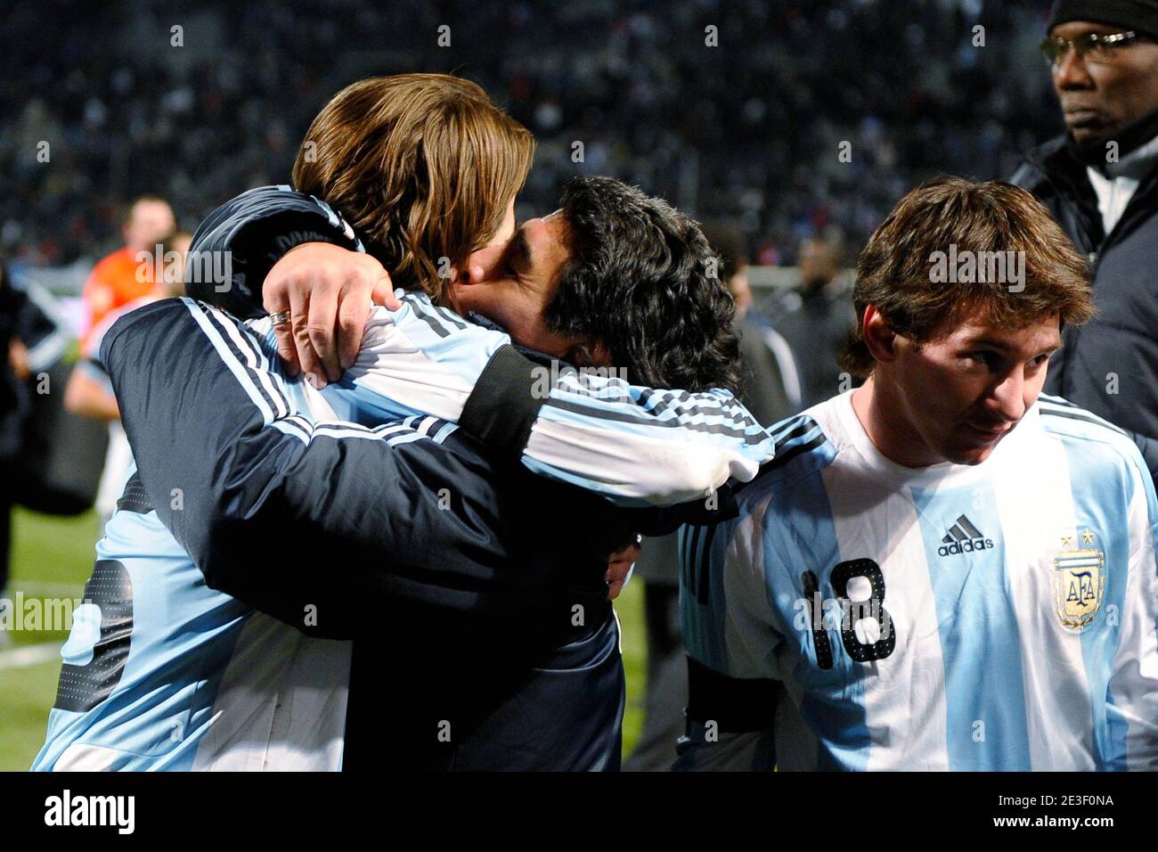 Diego Maradona, coach of Argentina congratulates Fernando Gago (Lionel Messi is seen on the right) during the friendly international soccer match France vs Argentina in Marseille, France on February 11, 2009.Argentina won 2-0. Photo by Henri Szwarc-Cameleon-ABACAPRESS.COM Stock Photo