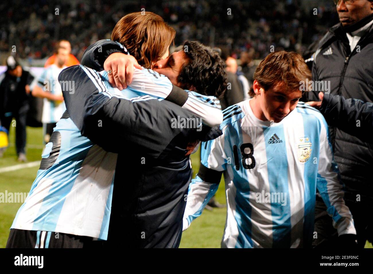 Diego Maradona, coach of Argentina congratulates Fernando Gago (Lionel Messi is seen on the right) during the friendly international soccer match France vs Argentina in Marseille, France on February 11, 2009.Argentina won 2-0. Photo by Henri Szwarc-Cameleon-ABACAPRESS.COM Stock Photo