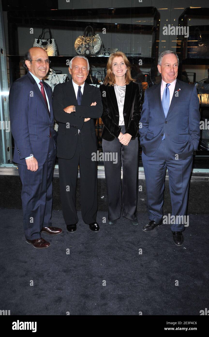 (L-R) New York City Schools Chancellor Joel Klein, Italian designer Giorgio Armani, Caroline Kennedy and New York City Mayor Michael Bloomberg arriving for the opening of the Giorgio Armani flagship store, 'Armani/5th Avenue' on Fifth Avenue in New York City, NY, USA on February 17, 2009. Photo by Gregorio Binuya/ABACAPRESS.COM Stock Photo