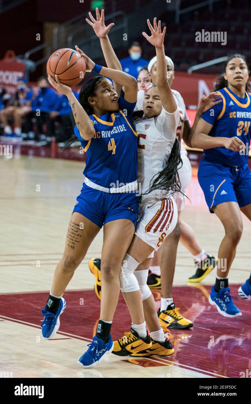 Los Angeles, United States. 17th Jan, 2021. UC Riverside Highlanders guard  Jada Holland (4) attempts to shoot over Southern California Trojans guard  Endyia Rogers (4) during an NCAA college basketball game, Thursday,