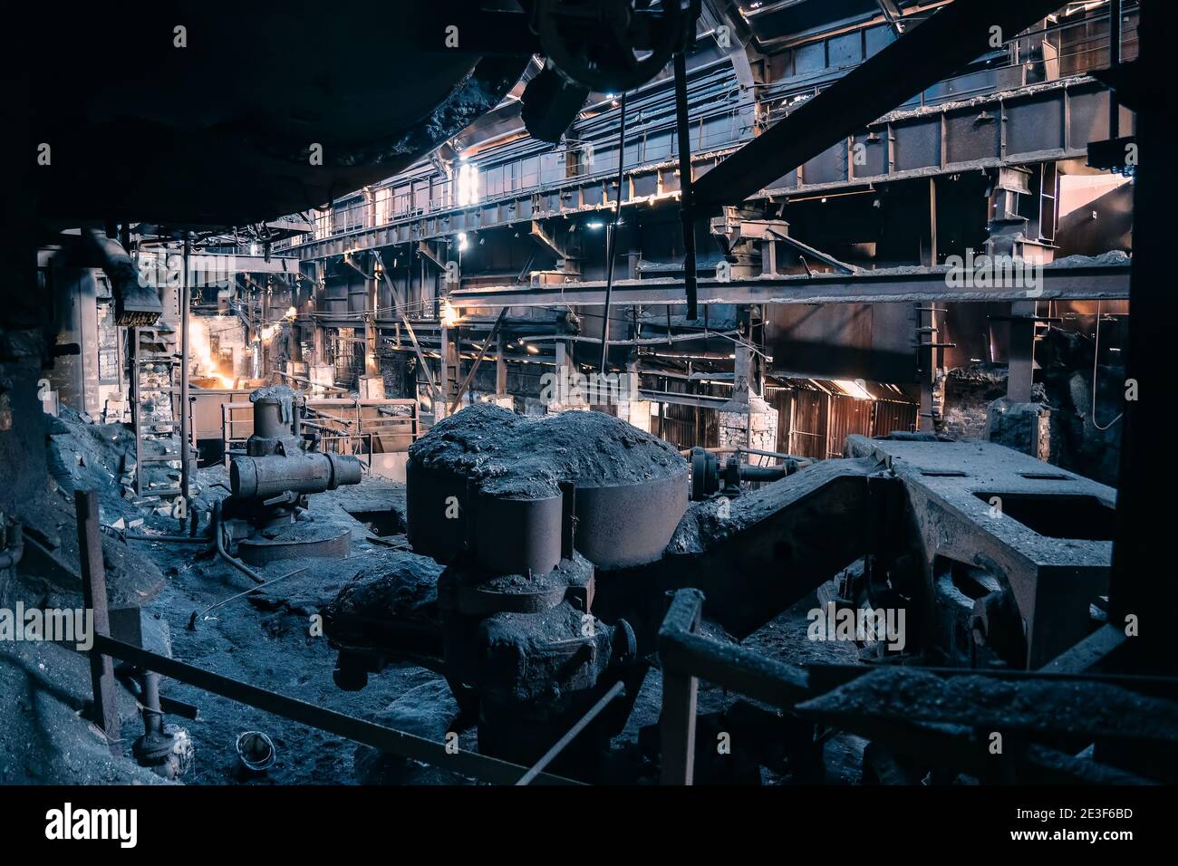 Large abandoned metallurgy factory workshop, hangar or warehouse inside ...