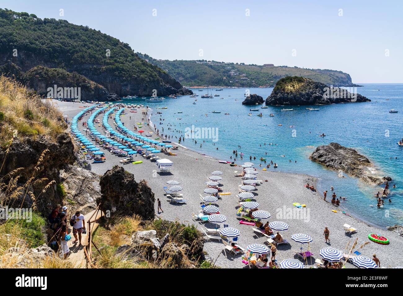 San Nicola Arcella, Calabria, Italy – Aug. 2020: A beautiful sandy beach near the famous Arcomagno cave Stock Photo
