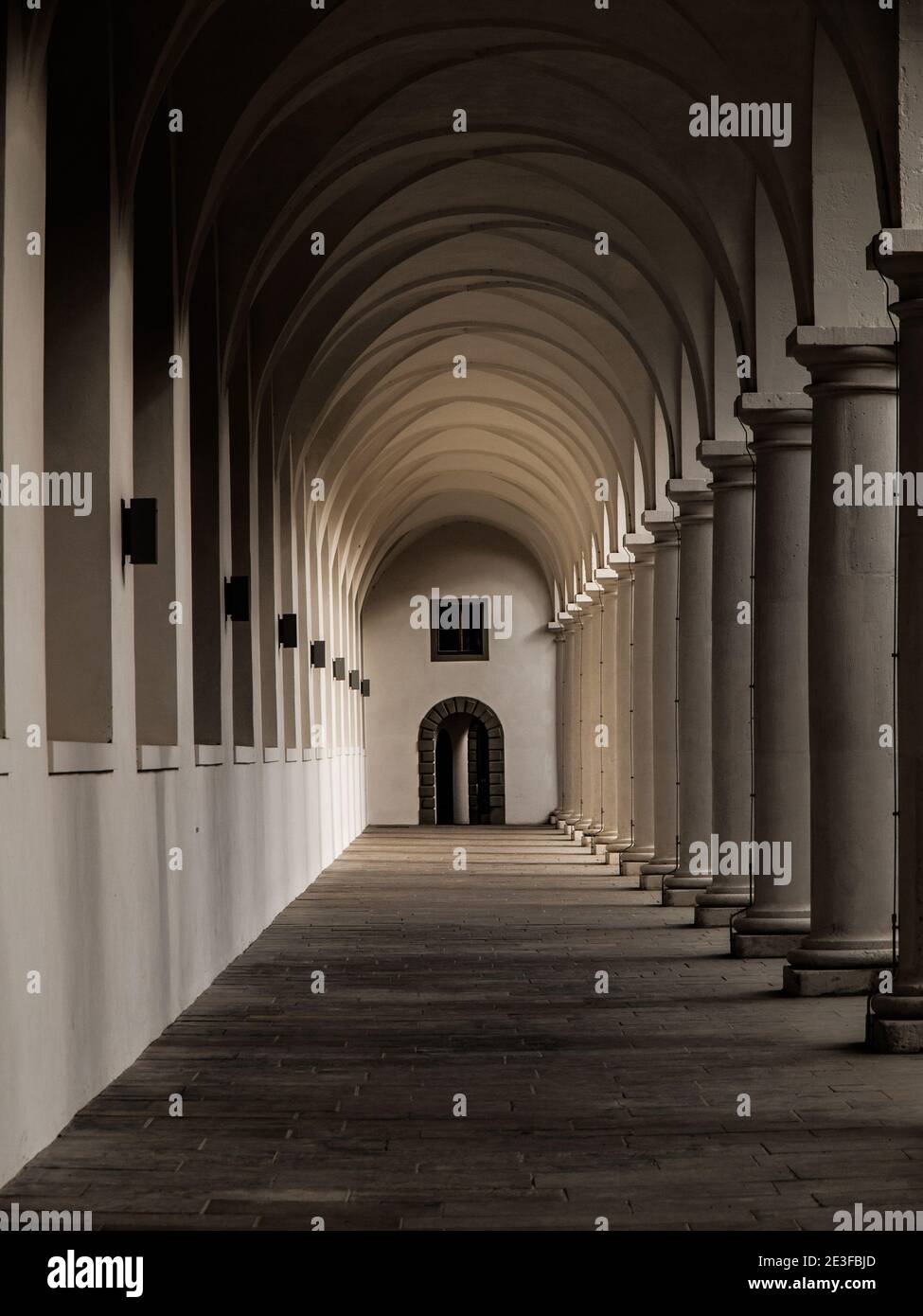 Long corridor with columns in historical building Stock Photo