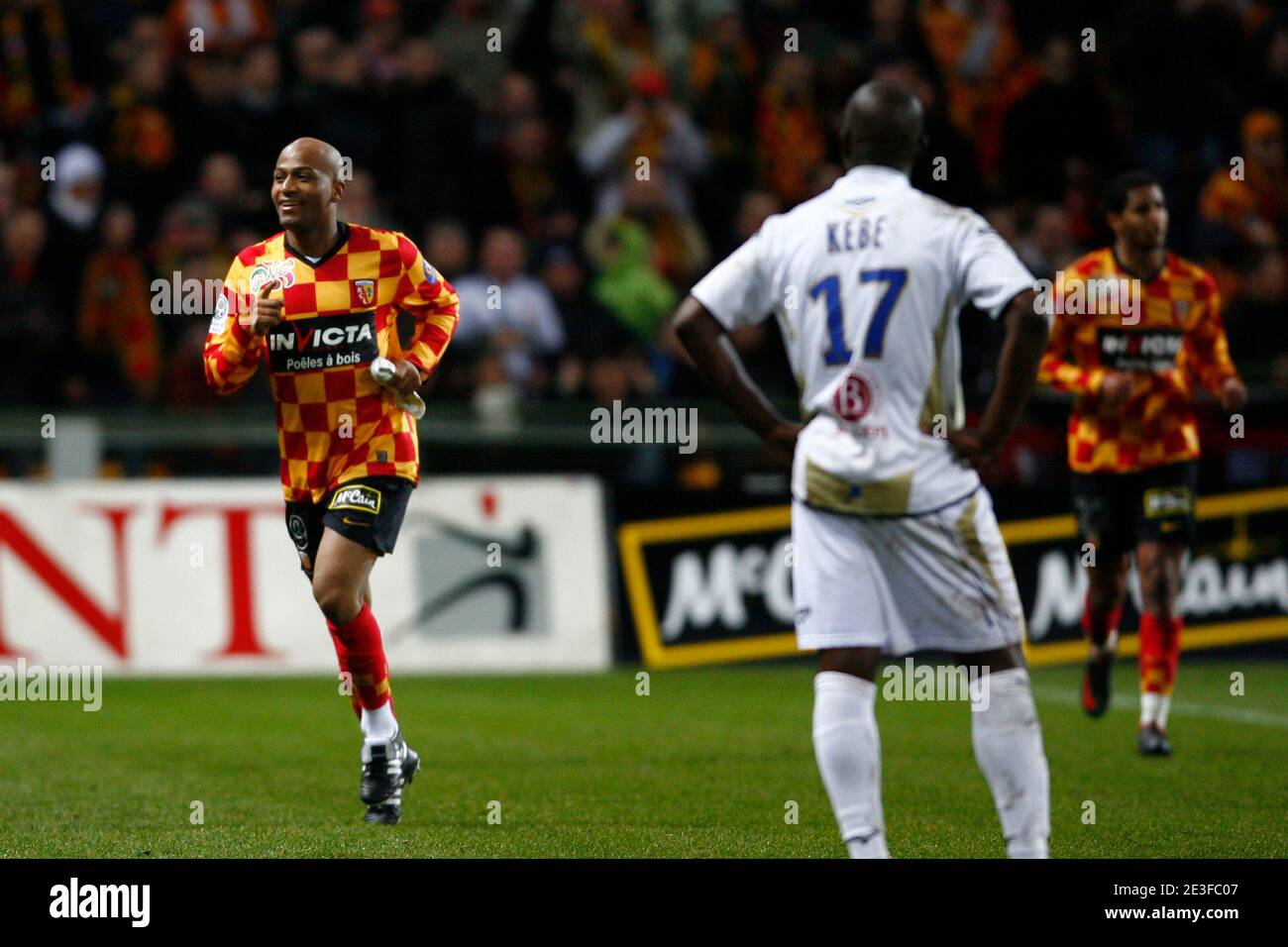 players of RC Lens and their president Joseph Oughourlian pictured  celebrating after winning and qualifying for the Champions League after a  soccer game between t Racing Club de Lens and AC Ajaccio