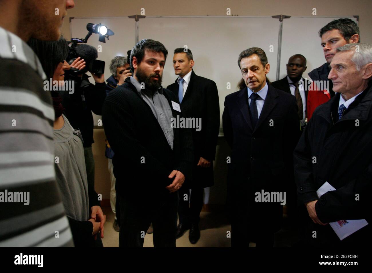 French President Nicolas Sarkozy flanked by Laurent Wauquiez Minister of State for Employment to the Minister for the Economy, Industry and Employment, visits Neopolis a training center in Alixan, near Valence, Southern France on March 3, 2009. Photo by Ludovic/Pool/ABACAPRESS.COM Stock Photo