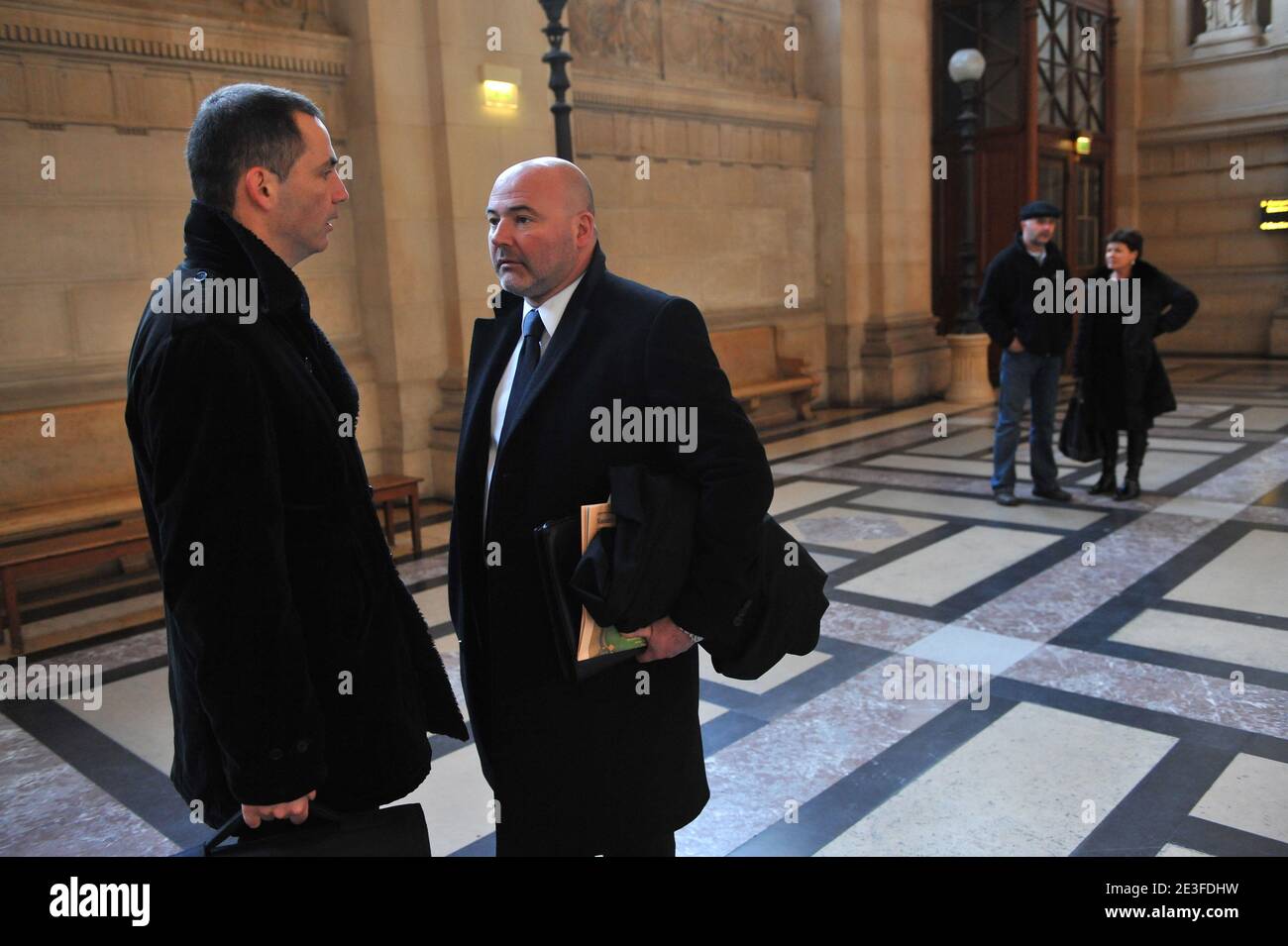 Yvan Colonna's laywers Gilles Simeoni speaks Pascal Garbarini behind Christine Colonna, Yvan Colonna's sister and Stephane Colonna, Yvan Colonna's brother at the Paris courthouse to attend the Yvan Colonna Trial, in Paris, France, on March 6, 2009. Photo by Mousse/ABACAPRESS.COM Stock Photo