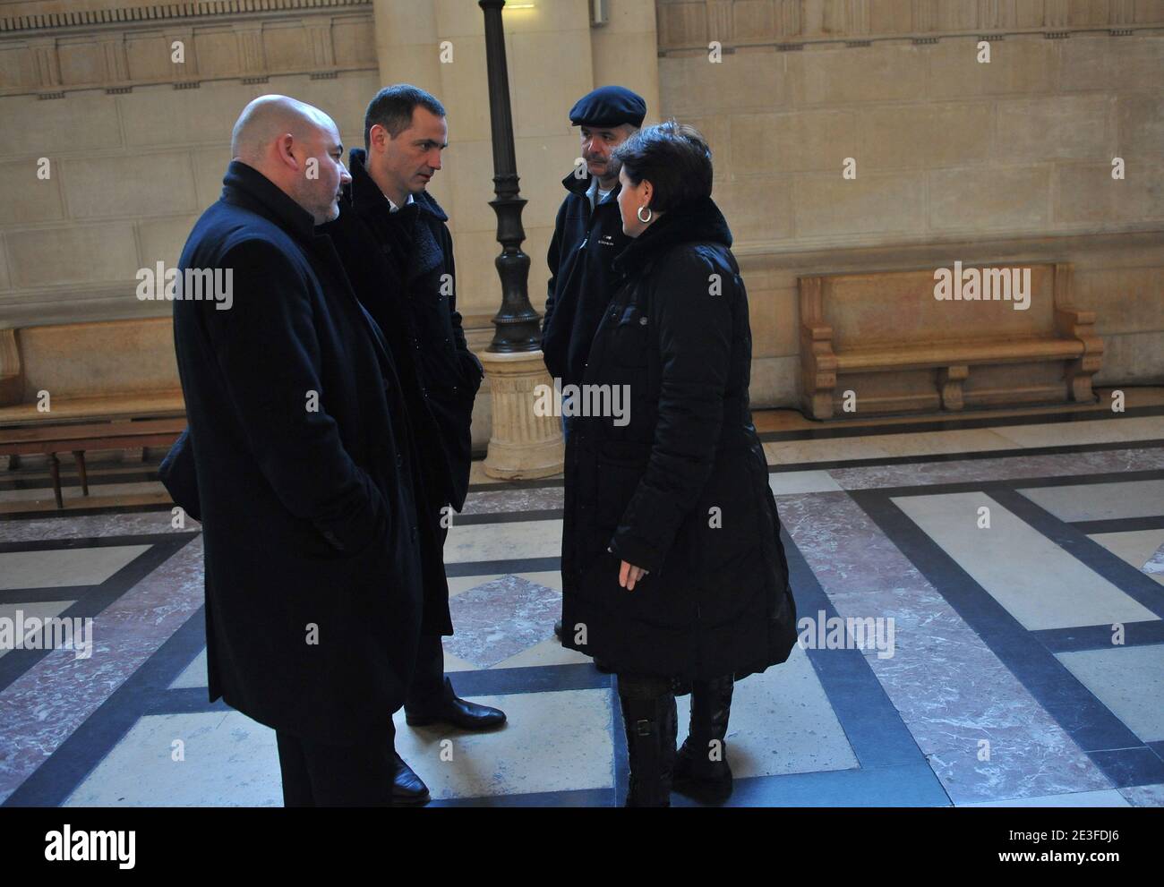 Yvan Colonna's laywers Pascal Garbarini and Gilles Simeoni speak with Christine Colonna, Yvan Colonna's sister and Stephane Colonna, Yvan Colonna's brother at the Paris courthouse to attend the Yvan Colonna Trial, in Paris, France, on March 6, 2009. Photo by Mousse/ABACAPRESS.COM Stock Photo