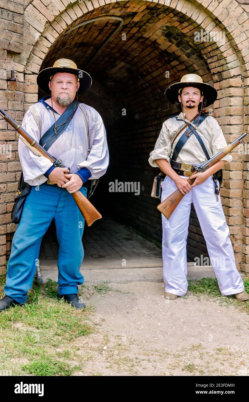 Civil War reenactors stand in the courtyard at Fort Gaines during a reenactment of the 150th Battle of Mobile Bay in Dauphin Island, Alabama. Stock Photo