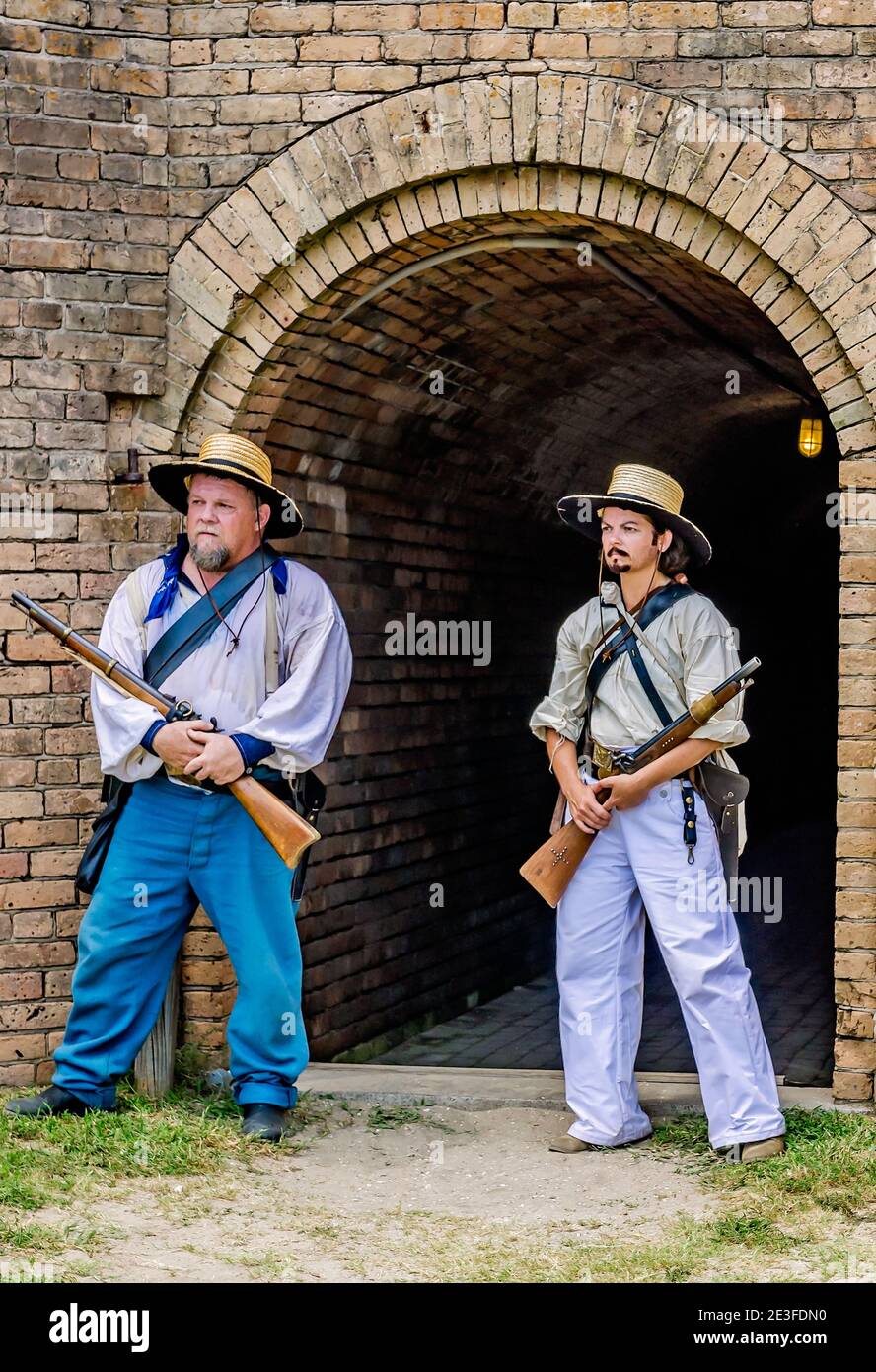 Civil War reenactors stand in the courtyard at Fort Gaines during a reenactment of the 150th Battle of Mobile Bay in Dauphin Island, Alabama. Stock Photo