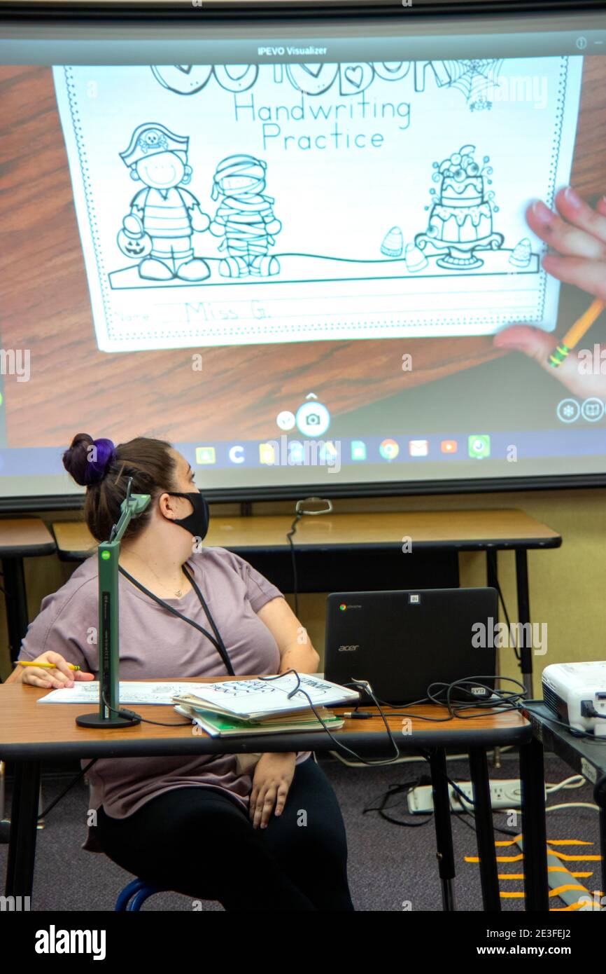 Wearing a face mask due to the coronavirus pandemic, a Southern