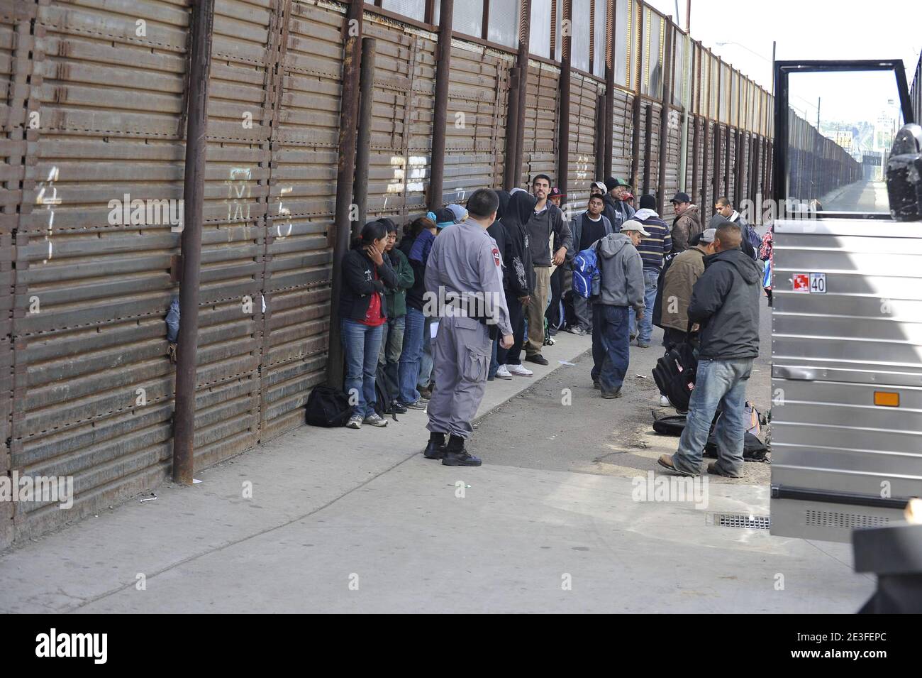 Mexicans migrants wait at the border crossing from Tijuana to San Ysidro, Mexico on March 6, 2009. This border crossing from Tijuana, Mexico to San Ysidro, California United States is the world's busiest border crossing. Photo by Gregoire Elodie/ABACAPRESS.COM Stock Photo