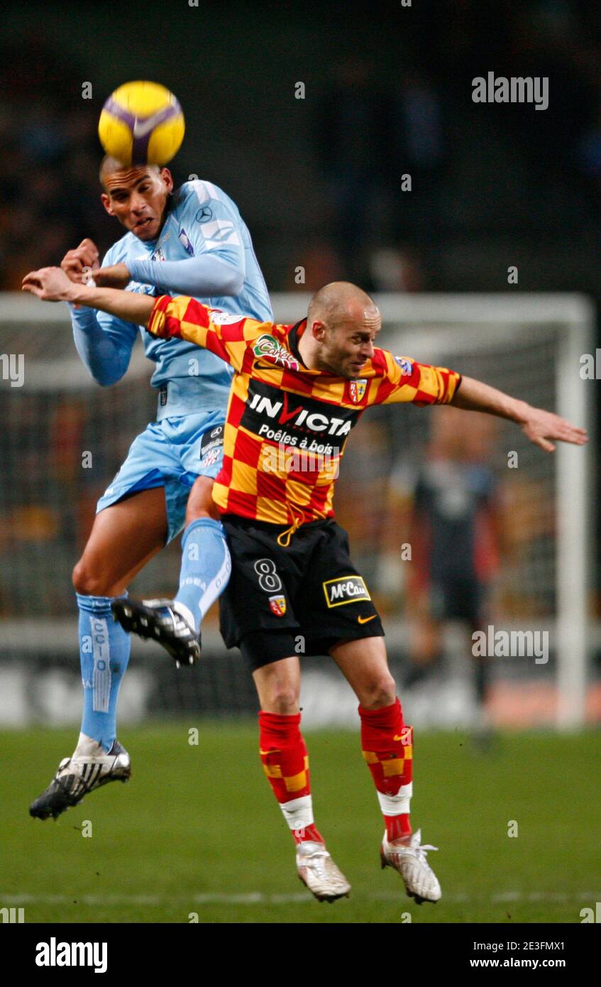 Ajaccio's Carl Medjani challenges Lens' Geoffrey Doumeng during the French Second League Soccer match, Racing Club de Lens vs AC Ajaccio at the Felix Bollaert stadium in Lens, France on March 13, 2009. AC Ajaccio won 1-0. Photo by Mikael LIbert/ABACAPRESS.COM Stock Photo