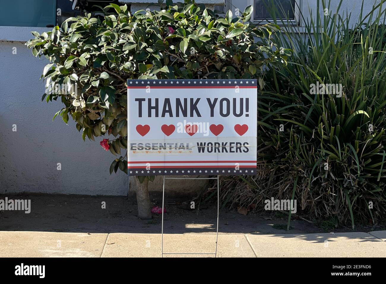 A 'Thank You Essential Workers' sign at a residence, Monday, Jan. 18, 2021, in Monterey Park, Calif. Stock Photo