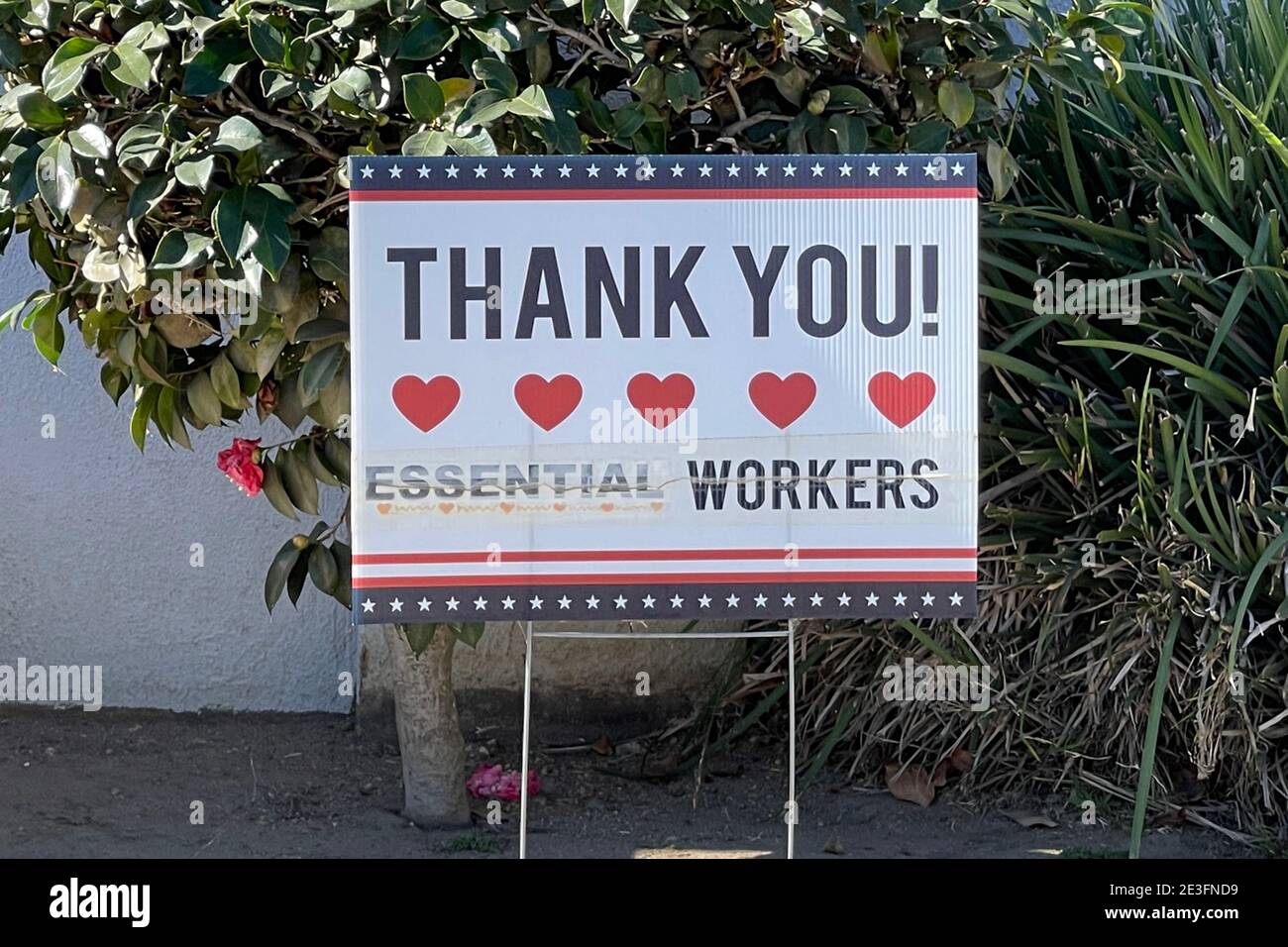 A 'Thank You Essential Workers' sign at a residence, Monday, Jan. 18, 2021, in Monterey Park, Calif. Stock Photo