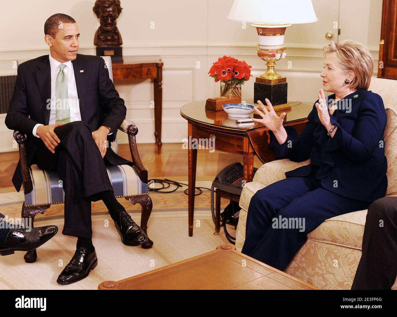 US President Barack Obama and Secretary of State Hillary Clinton meet with Irish Taoiseach (Prime Minister) Brian Cowen in the Oval Ofice at the White House. in Washington DC, USA on March 17, 2009. Photo by Olivier Douliery/ABACAPRESS.COM Stock Photo