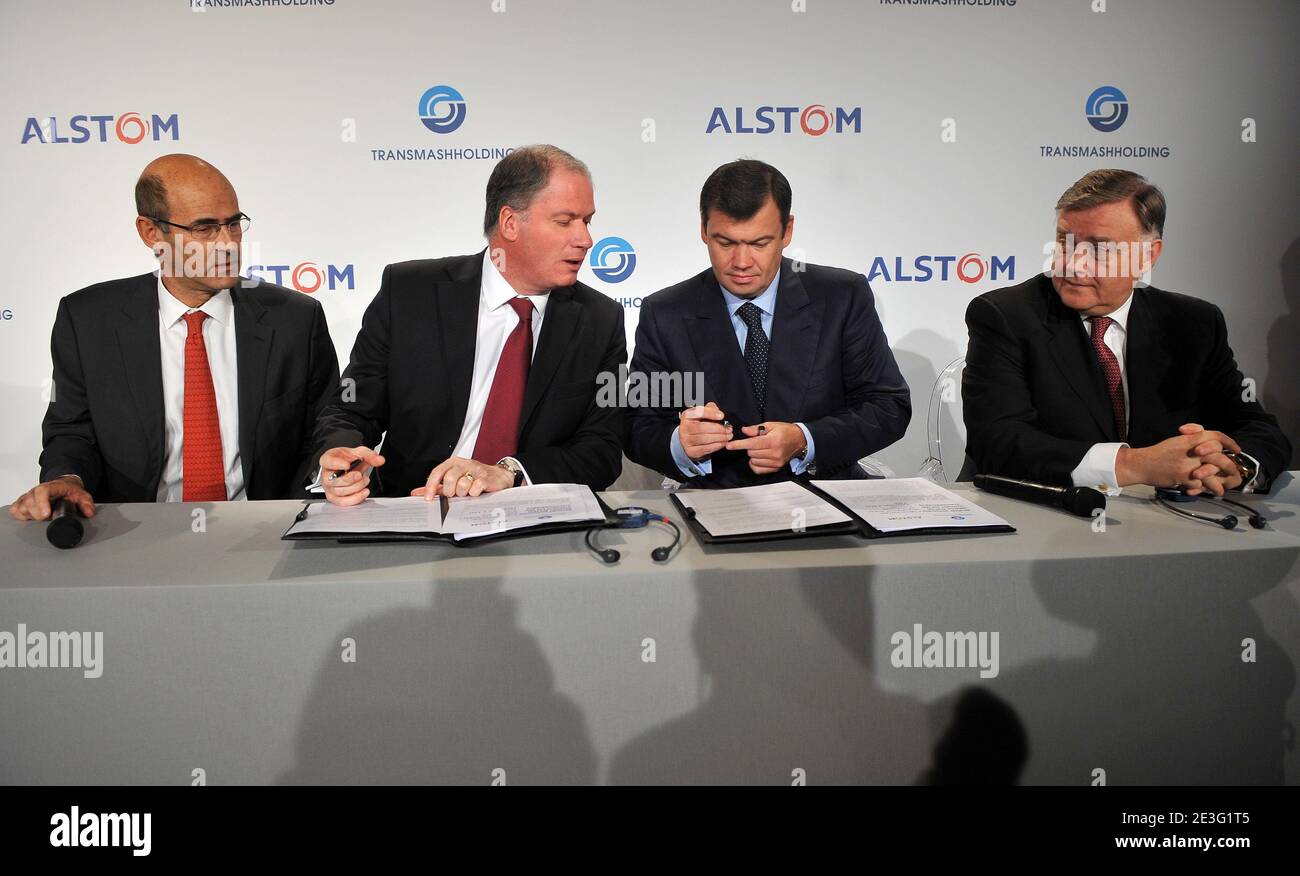 Head of the French engineering group Alstom Patrick Kron, President of the transport sector of the French engineering group Alstom Philippe Mellier, President of Transmashholding Andrei Bokarev and Head of Russian Railroads Vladimir Yakunin sign an agreement during press conference at Hotel Hyatt-Vendome in Paris, France on March 31, 2009. Photo by Mousse/ABACAPRESS.COM Stock Photo