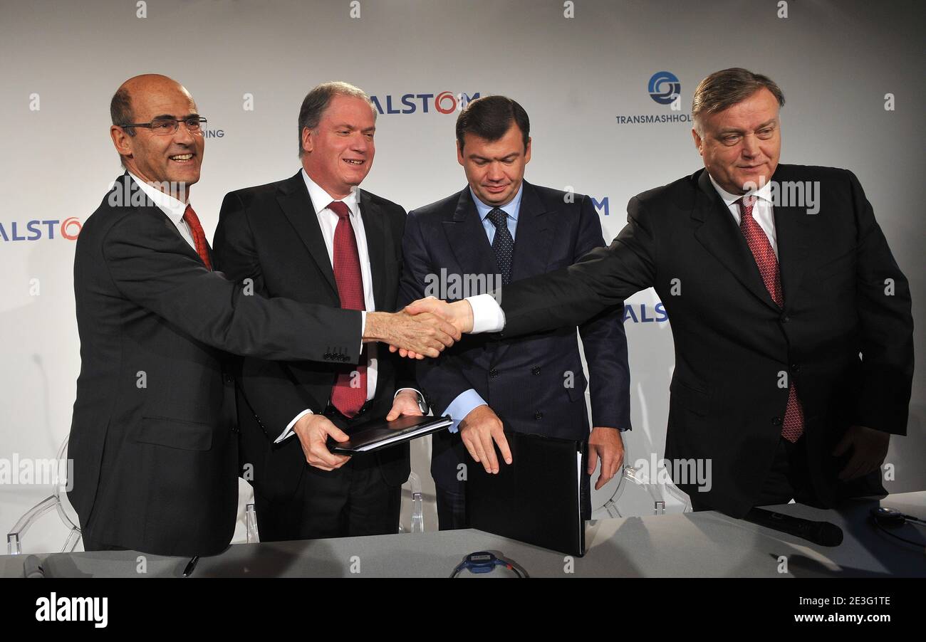 Head of the French engineering group Alstom Patrick Kron, President of the transport sector of the French engineering group Alstom Philippe Mellier, President of Transmashholding Andrei Bokarev and Head of Russian Railroads Vladimir Yakunin sign an agreement during press conference at Hotel Hyatt-Vendome in Paris, France on March 31, 2009. Photo by Mousse/ABACAPRESS.COM Stock Photo