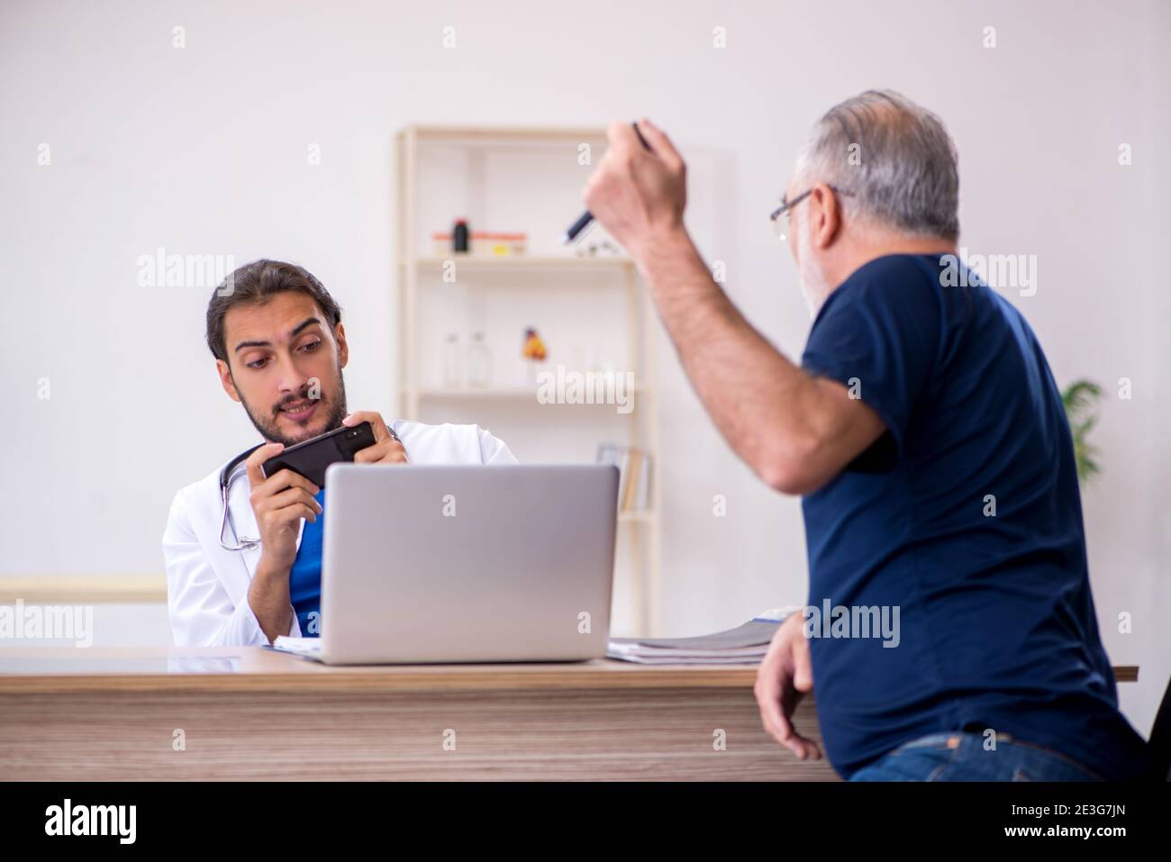 Old man waiting medical examination hi-res stock photography and images ...
