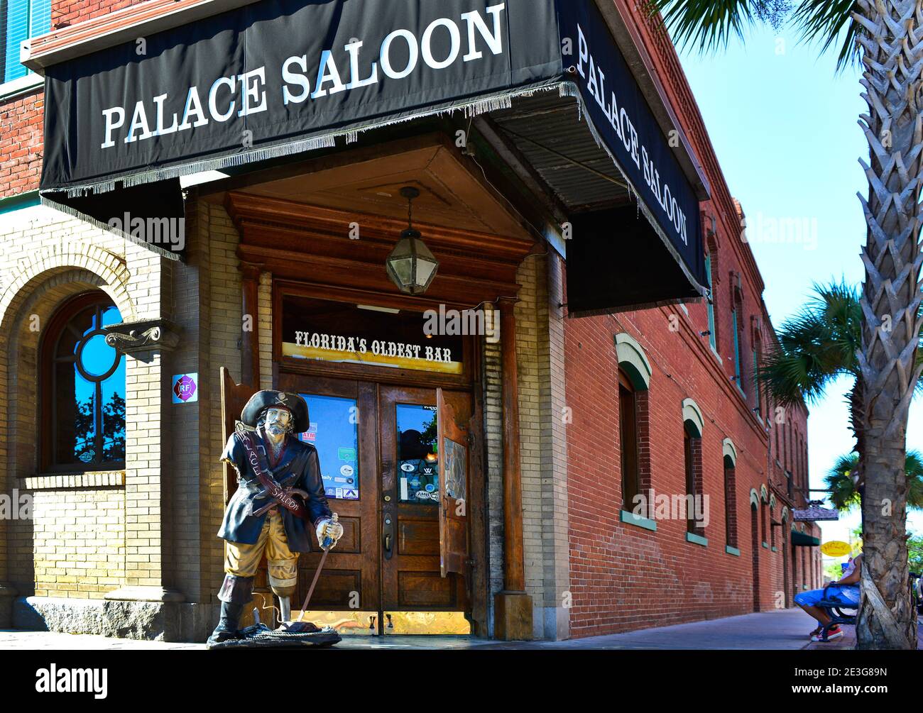 A one legged pirate statue greets patrons as they enter the Oldest Bar in Florida, the Palace Saloon in Fernandina Beach, FL on Amelia Island, Stock Photo