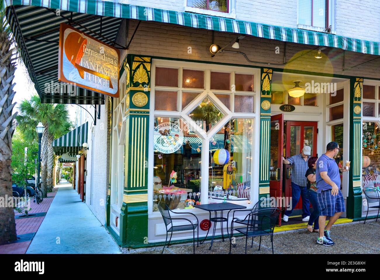 People leaving with ice cream cones from a charming little shop, Fernandina's Fantastic Fudge store on Centre Street in Fernandina Beach, on Amelia Is Stock Photo